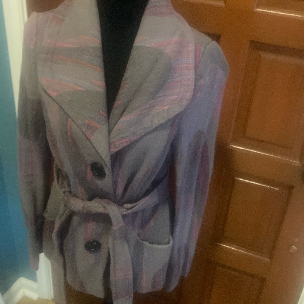 Jacket- light purple with multiple color design.